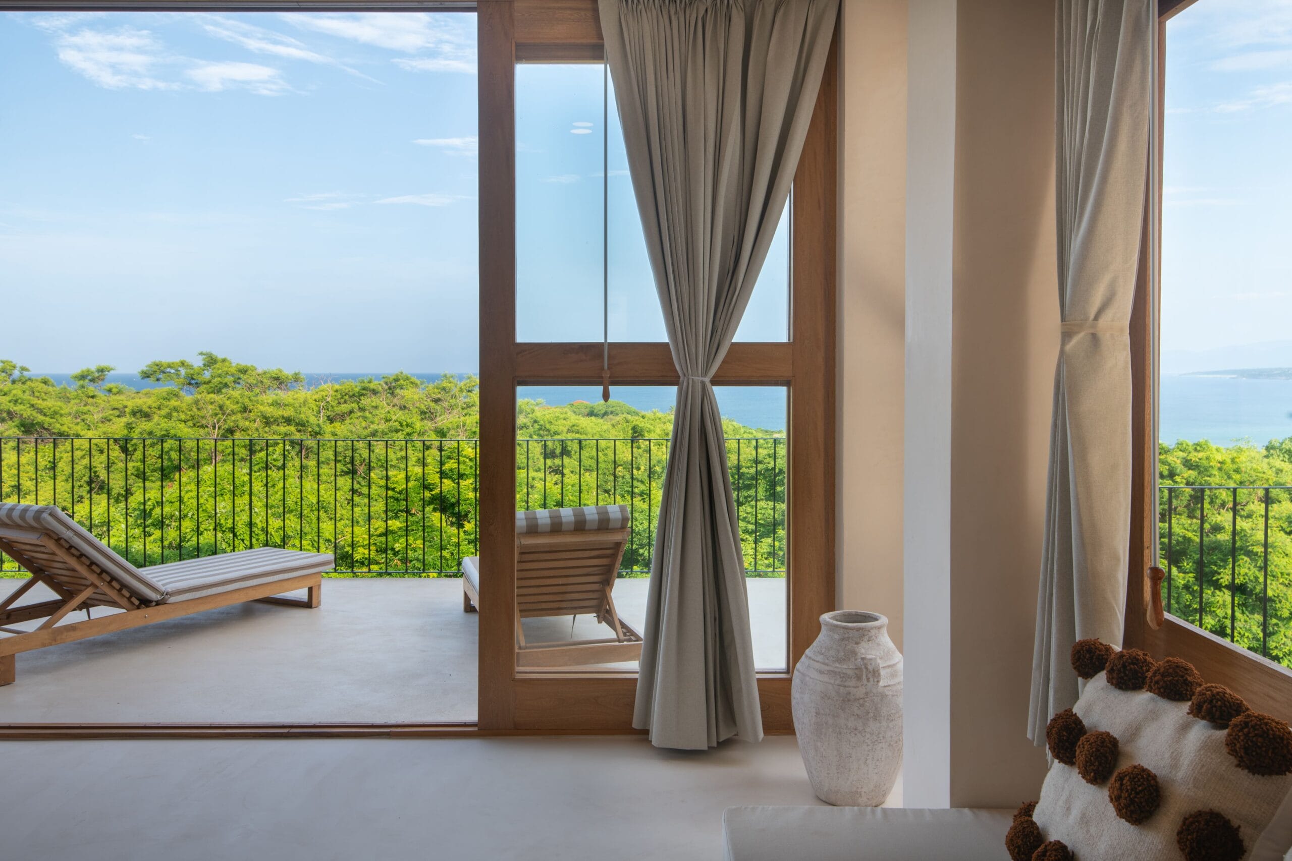 Taco Champagne - Hom - balcon con vista al mar